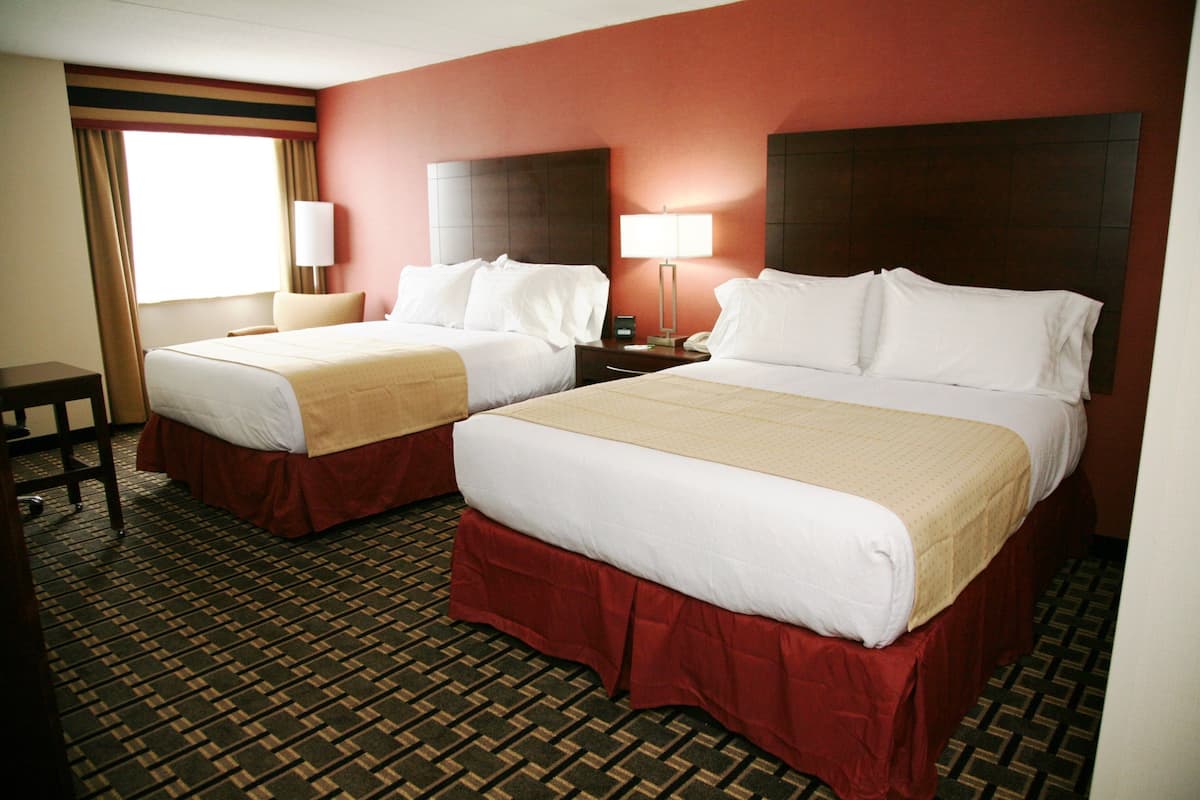 Premium bedding, desk, iron/ironing board, rollaway beds