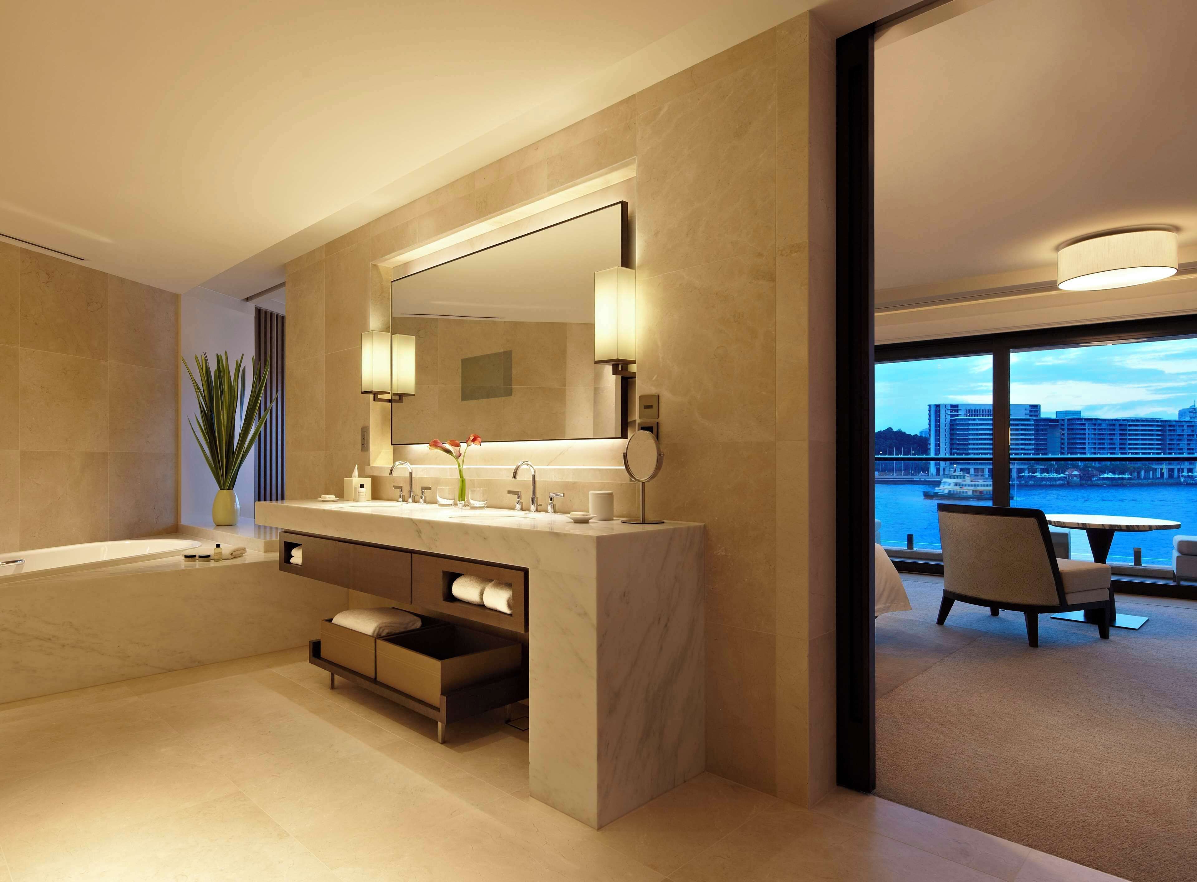 harbour suite | bathroom | separate bathtub and shower, deep-soaking bathtub, designer toiletries
