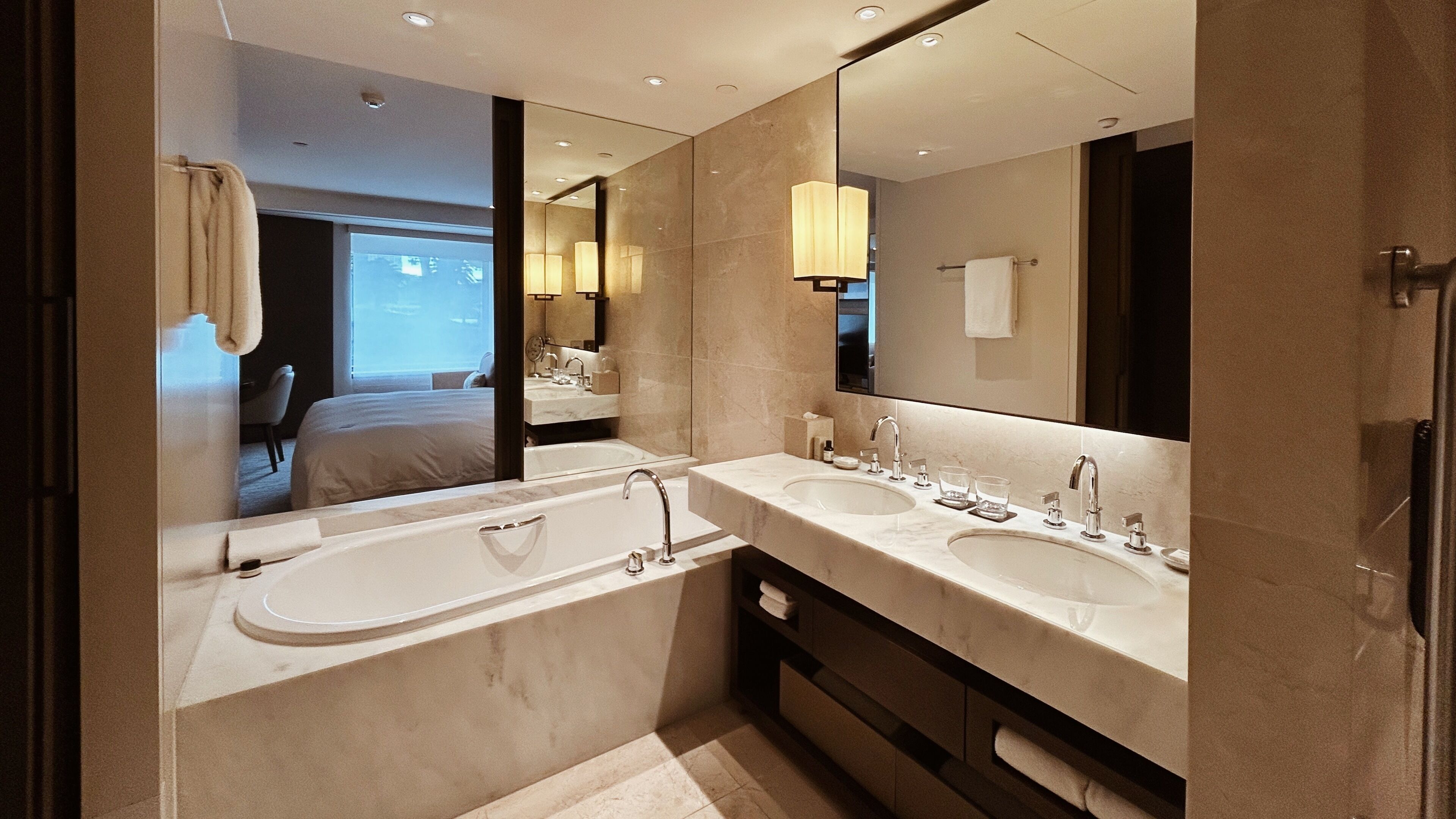 1 king bed | bathroom | separate bathtub and shower, deep-soaking bathtub, designer toiletries