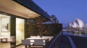 Enjoy a scenic view of the water from this balcony, overlooking the Sydney Opera House.
