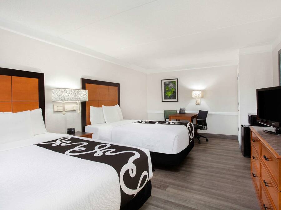 Pillowtop beds, desk, iron/ironing board, free cribs/infant beds