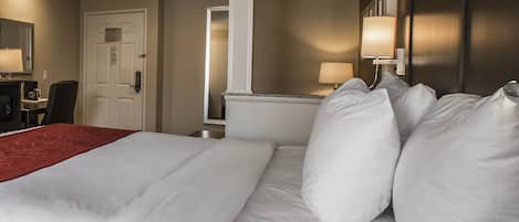 Pillow-top beds, desk, blackout curtains, iron/ironing board
