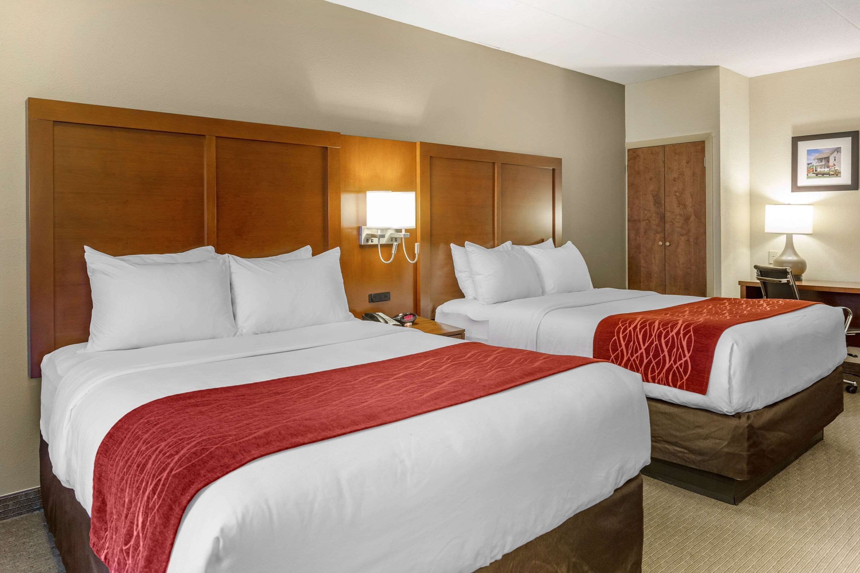 premium bedding, pillow-top beds, desk, blackout curtains