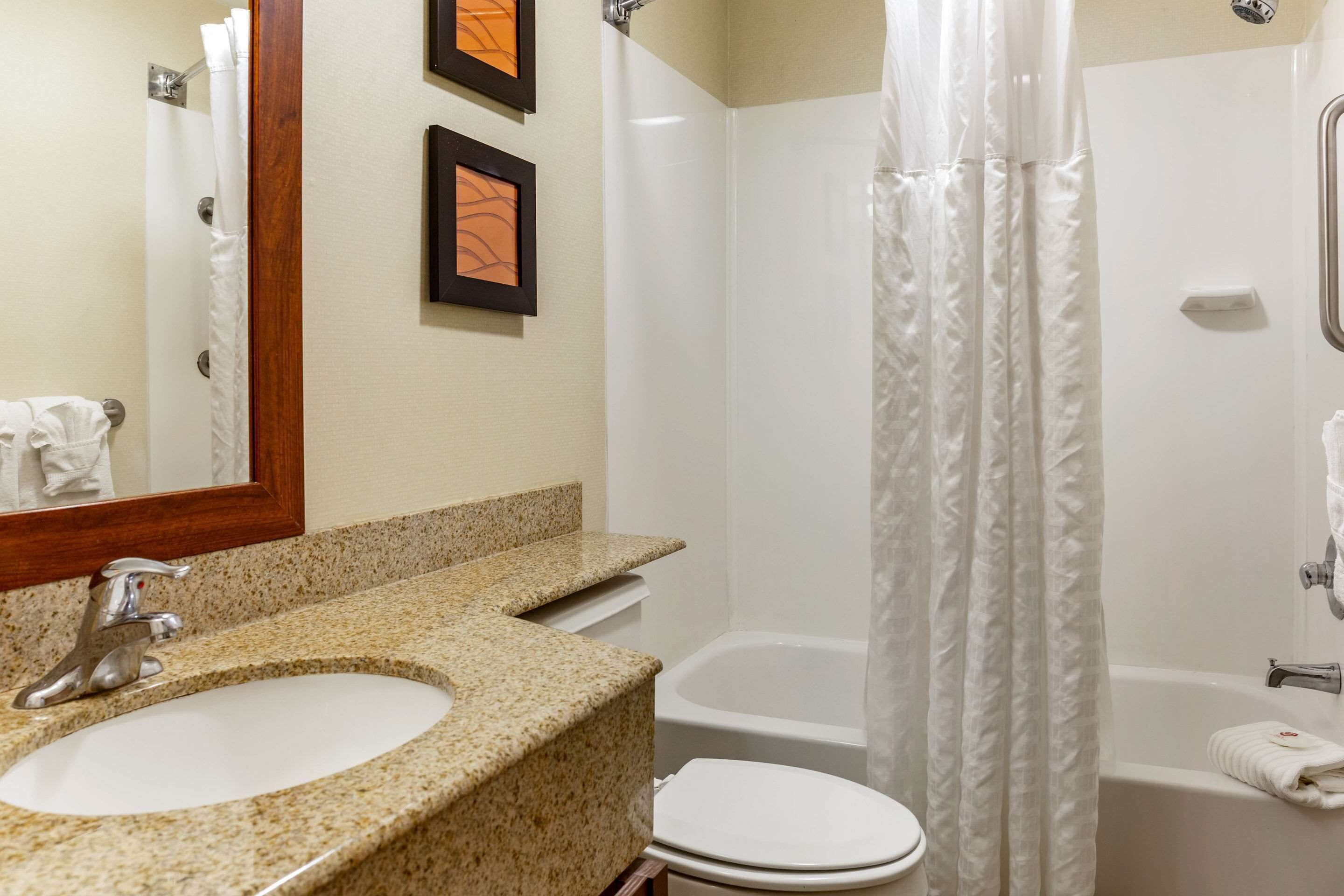 premium bedding, pillow-top beds, desk, blackout curtains