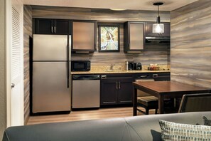 Studio, 1 King Bed with Sofa bed | Private kitchen | Full-size fridge, microwave, stovetop, dishwasher