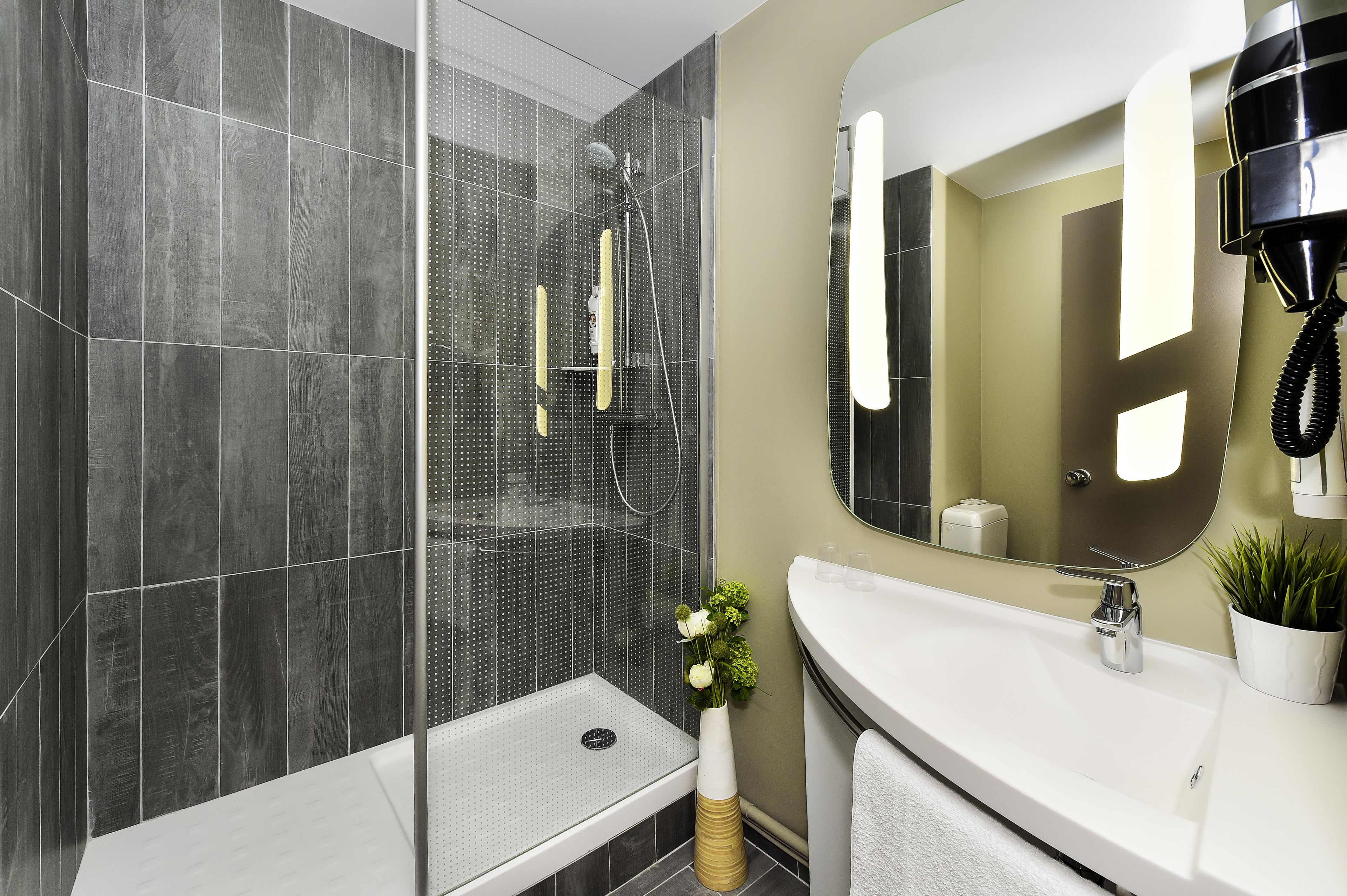 eco-friendly toiletries, hair dryer, towels, soap