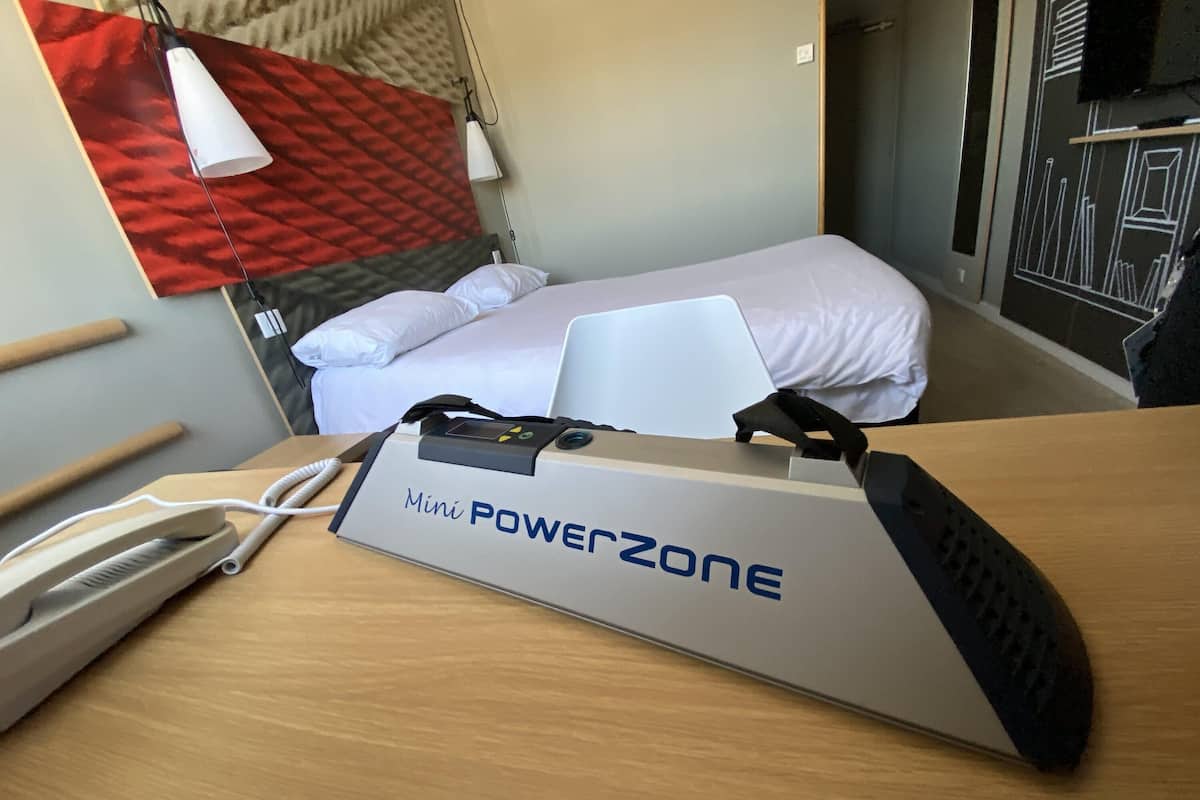 Premium bedding, desk, laptop workspace, blackout curtains