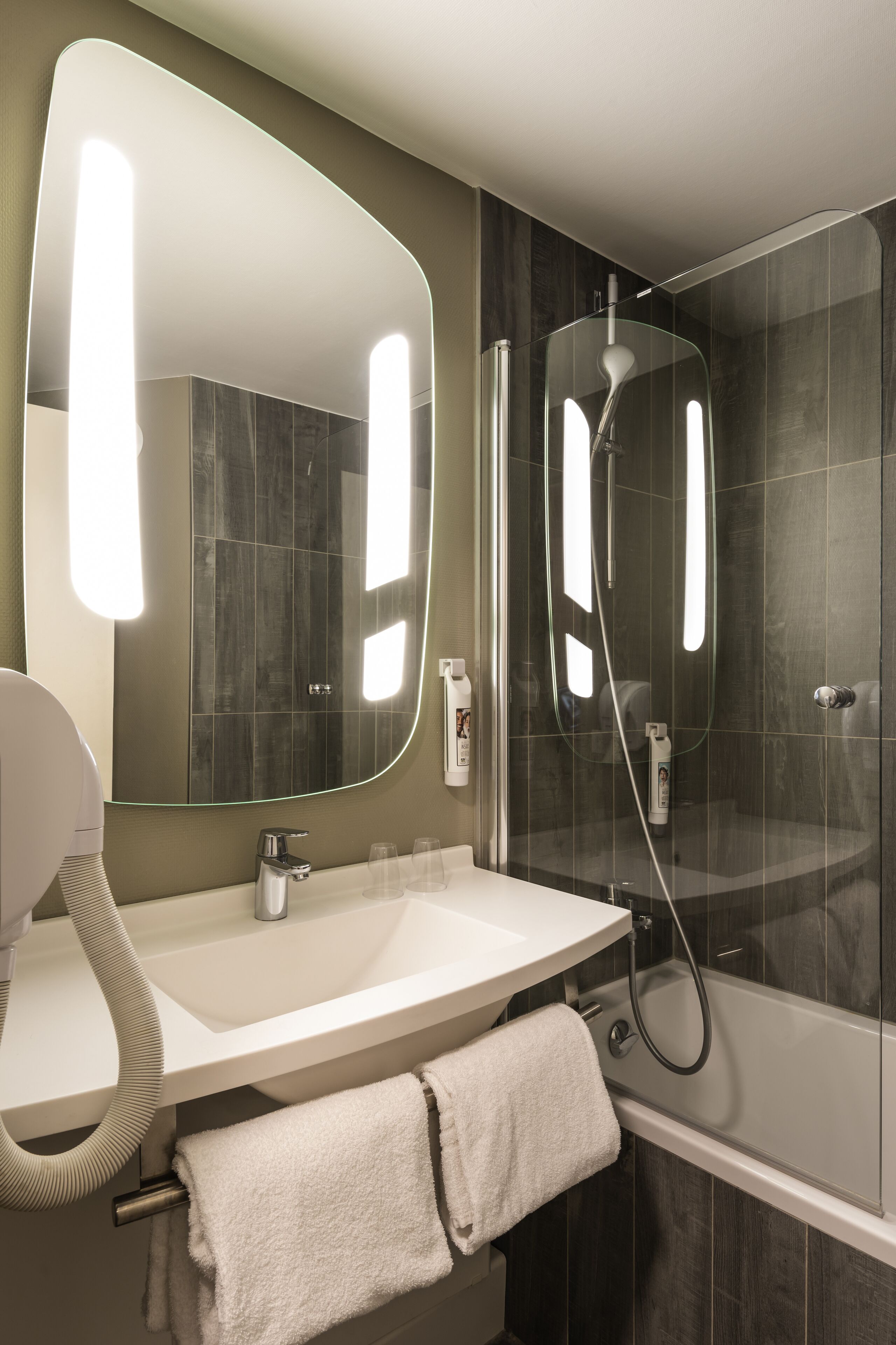 eco-friendly toiletries, hair dryer, towels, soap