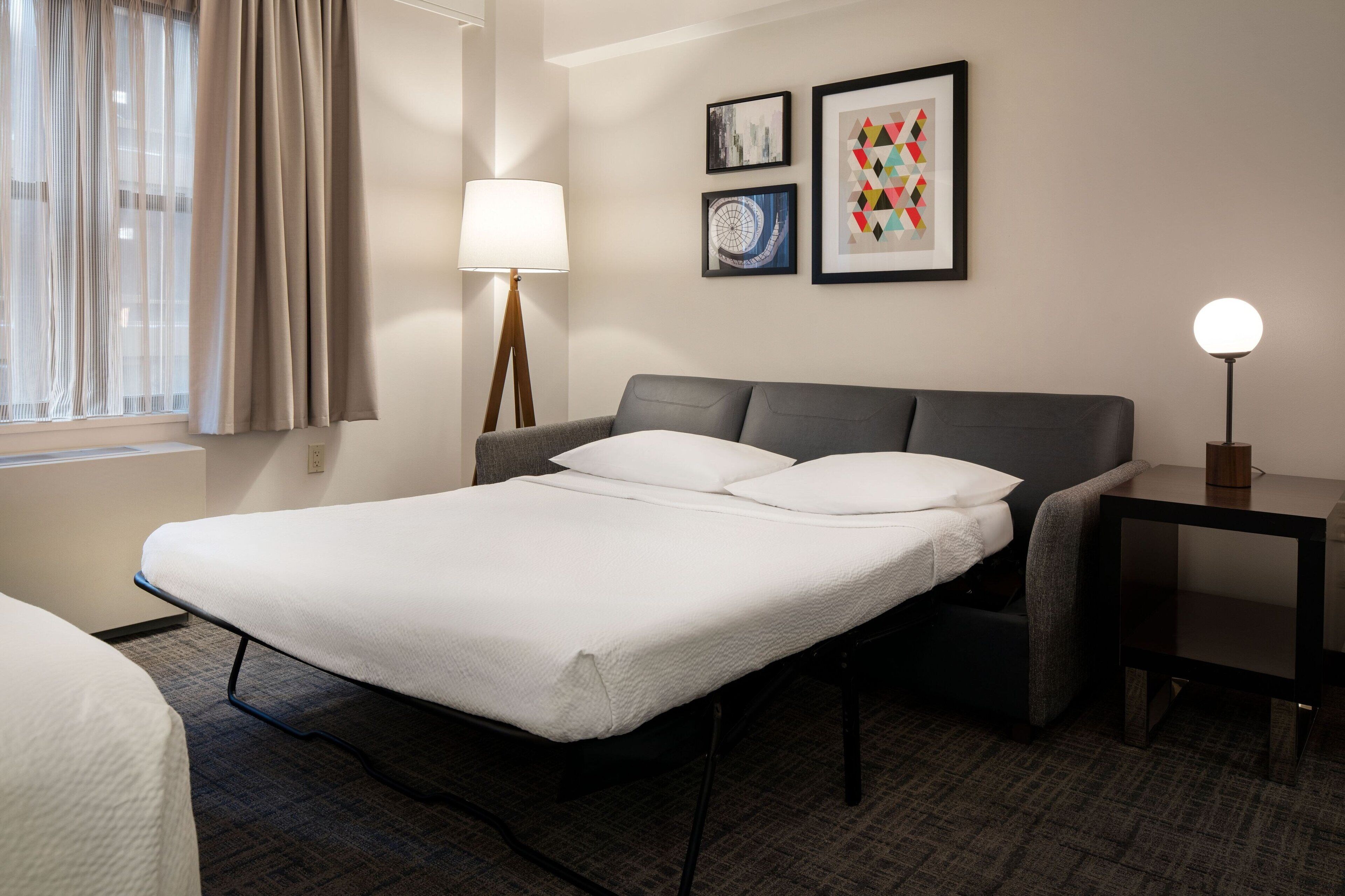 Hypo-allergenic bedding, in-room safe, desk, laptop workspace
