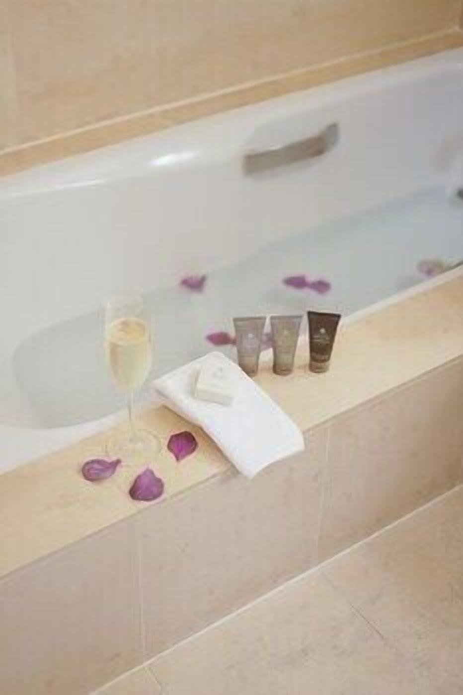 Bathroom | Designer toiletries, hair dryer, bathrobes, slippers