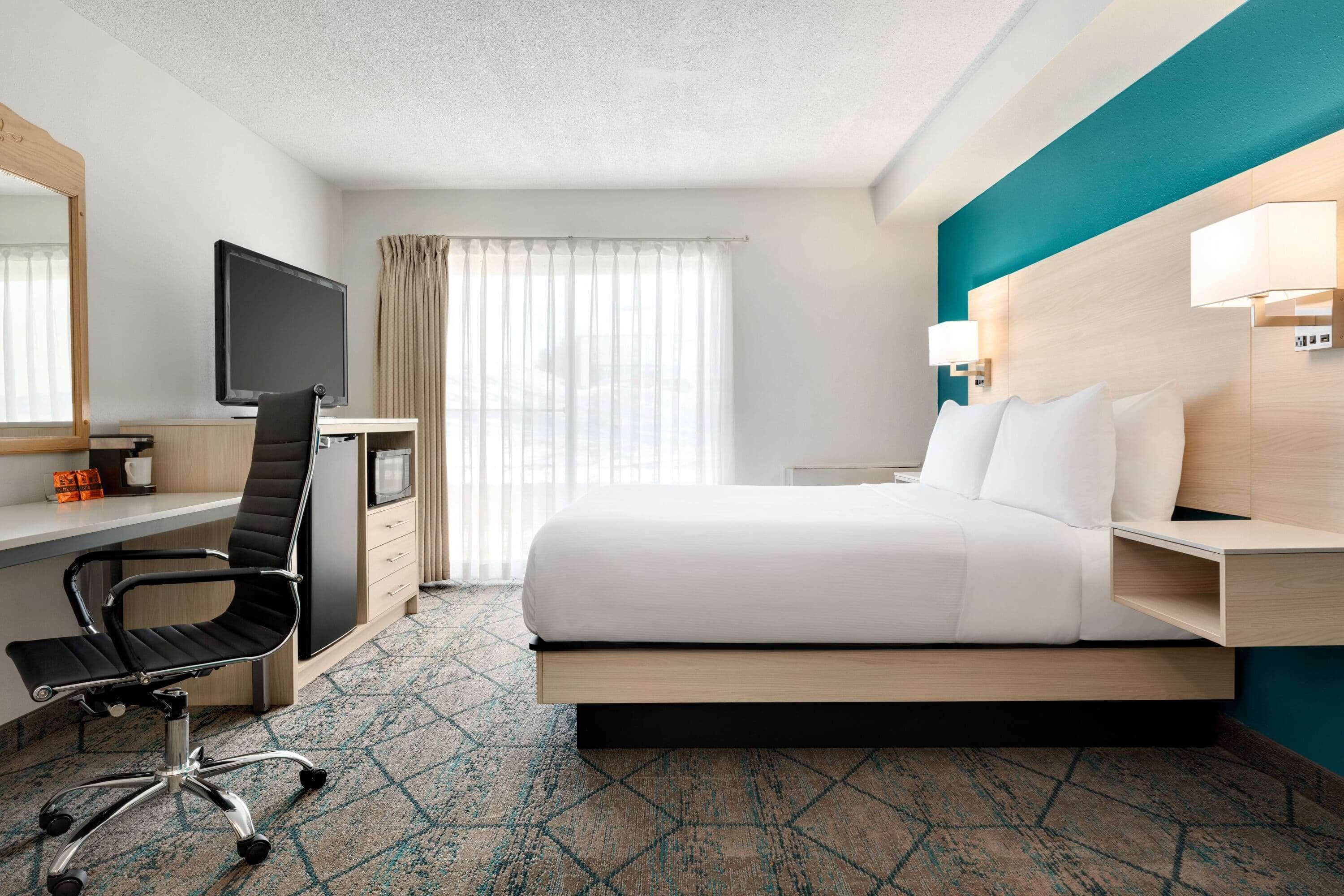 room, 2 queen beds, non smoking (first floor, patio door) | desk, laptop workspace, iron/ironing board, free wifi