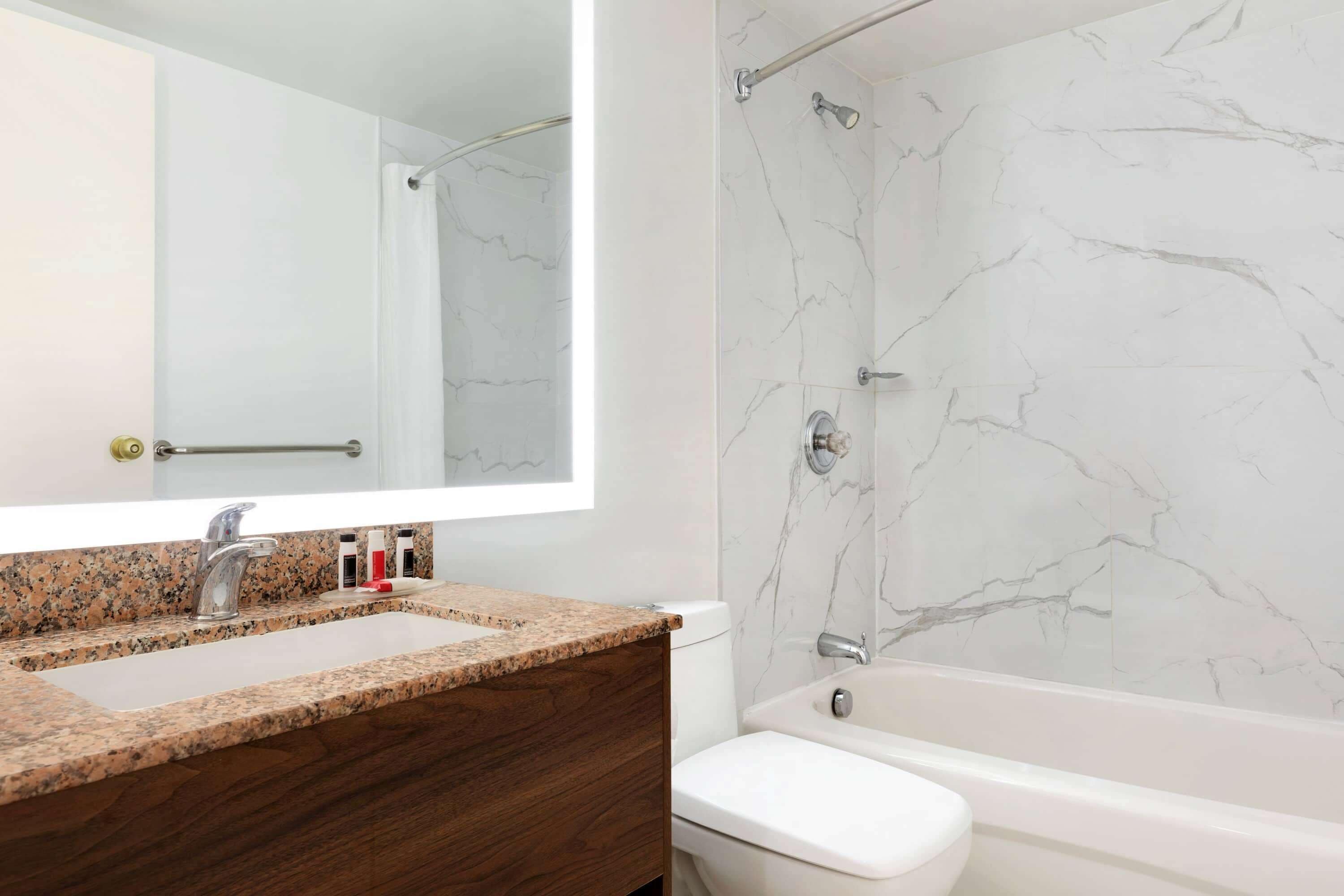 combined shower/bathtub, free toiletries, hair dryer, towels