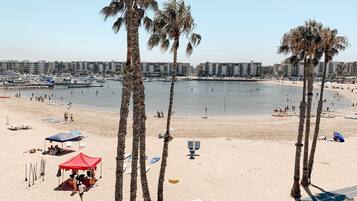On the beach, kayaking