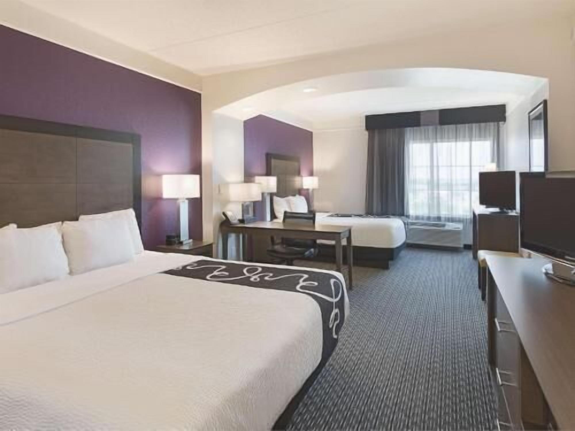 Premium bedding, desk, blackout drapes, iron/ironing board