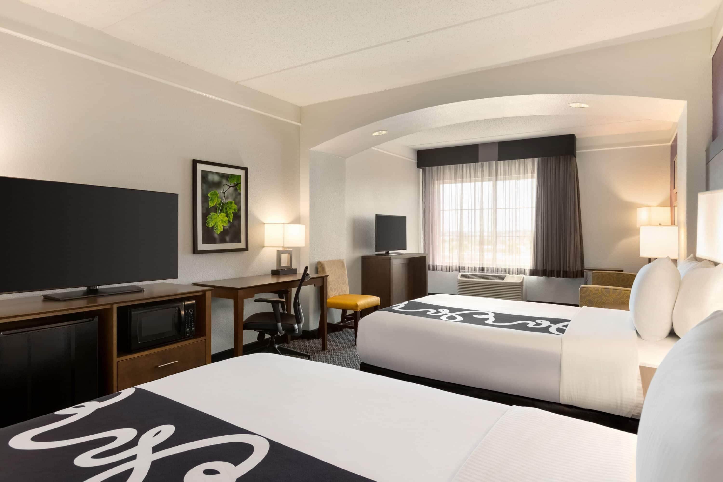 Premium bedding, desk, blackout drapes, iron/ironing board