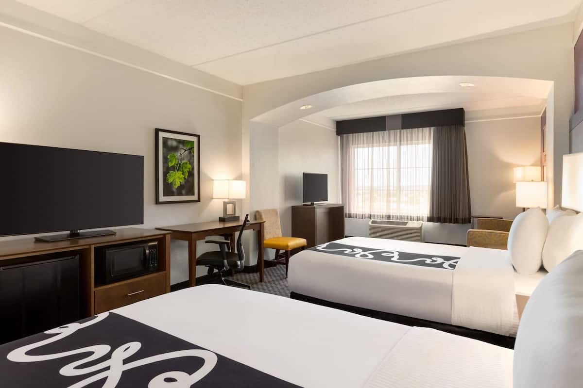 Premium bedding, desk, blackout drapes, iron/ironing board