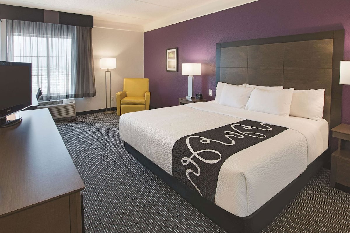 Premium bedding, desk, blackout curtains, iron/ironing board