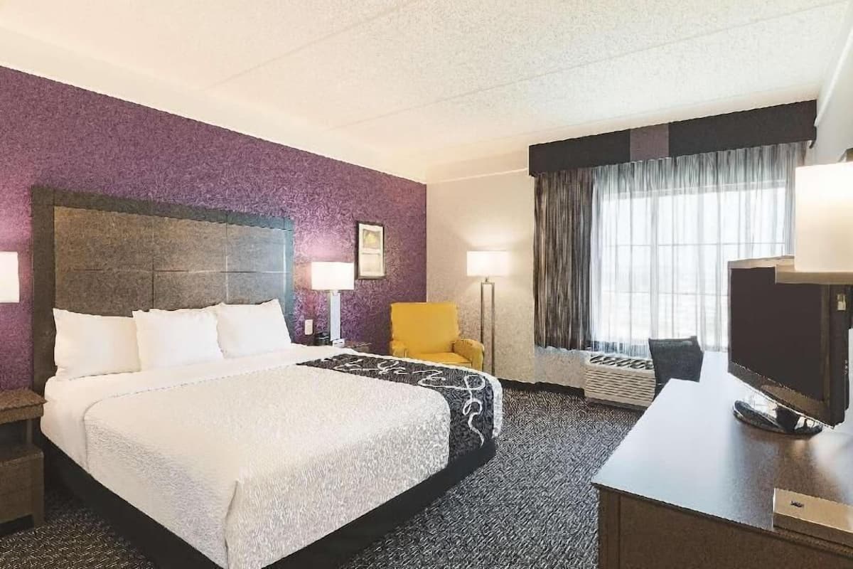 Premium bedding, desk, blackout curtains, iron/ironing board