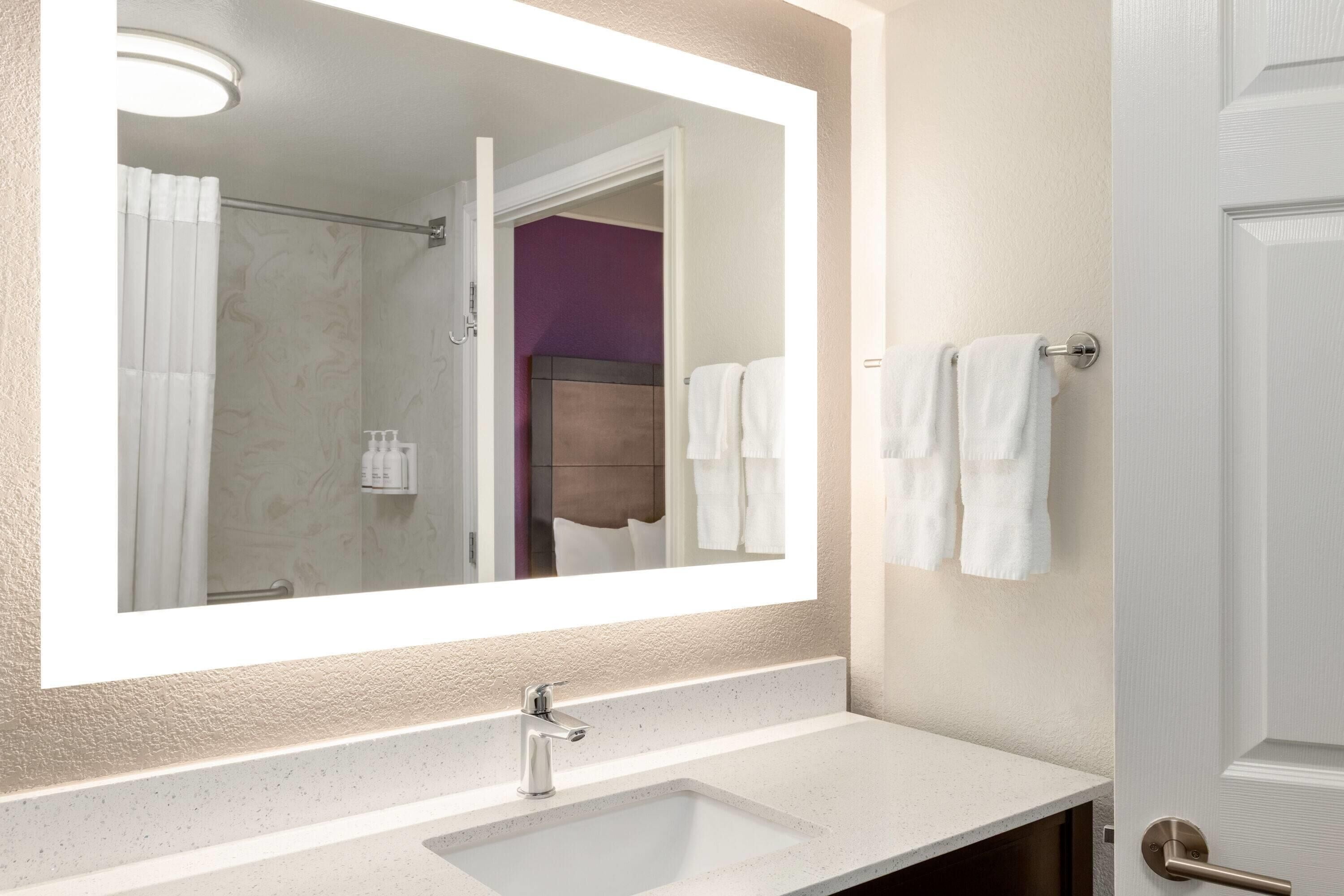 combined shower/bathtub, free toiletries, hair dryer, towels