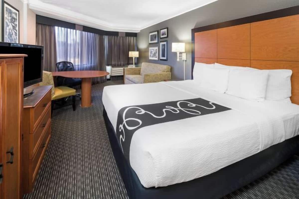 Premium bedding, desk, blackout curtains, iron/ironing board