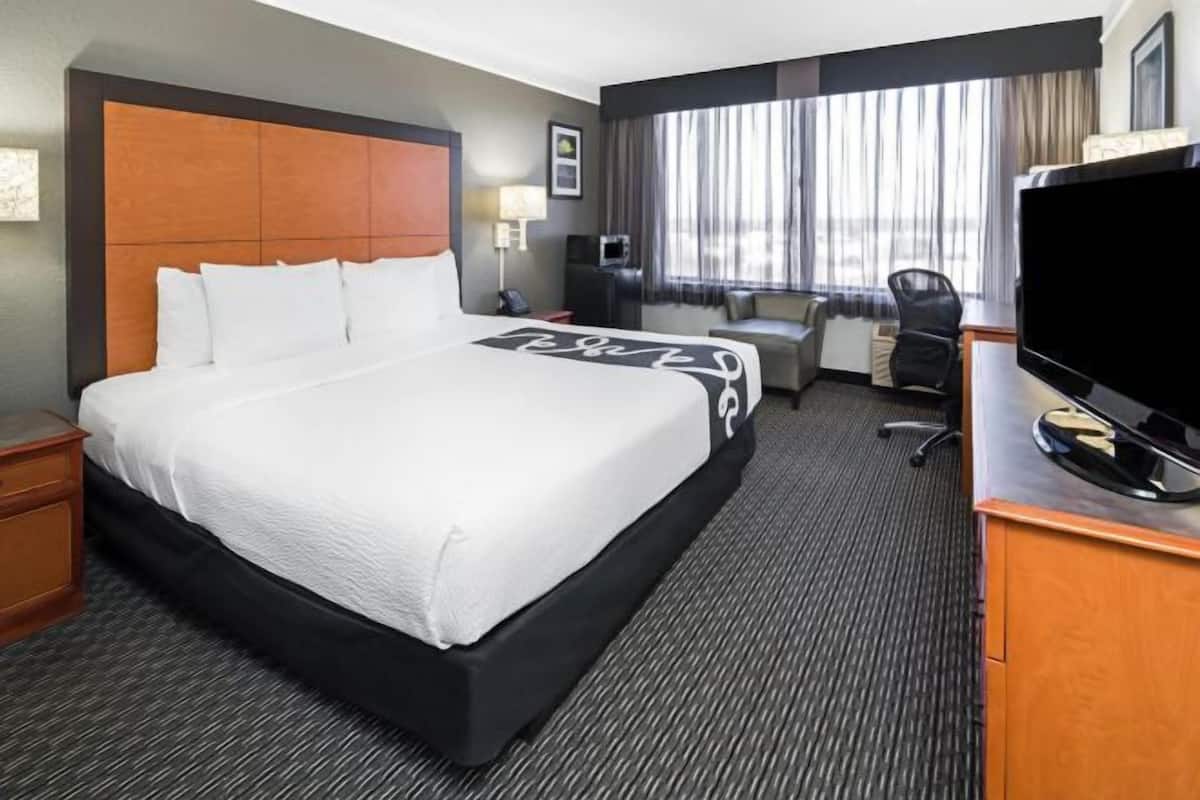 Premium bedding, desk, blackout curtains, iron/ironing board