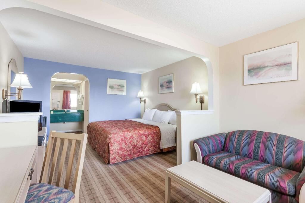 Blackout drapes, iron/ironing board, rollaway beds, free WiFi