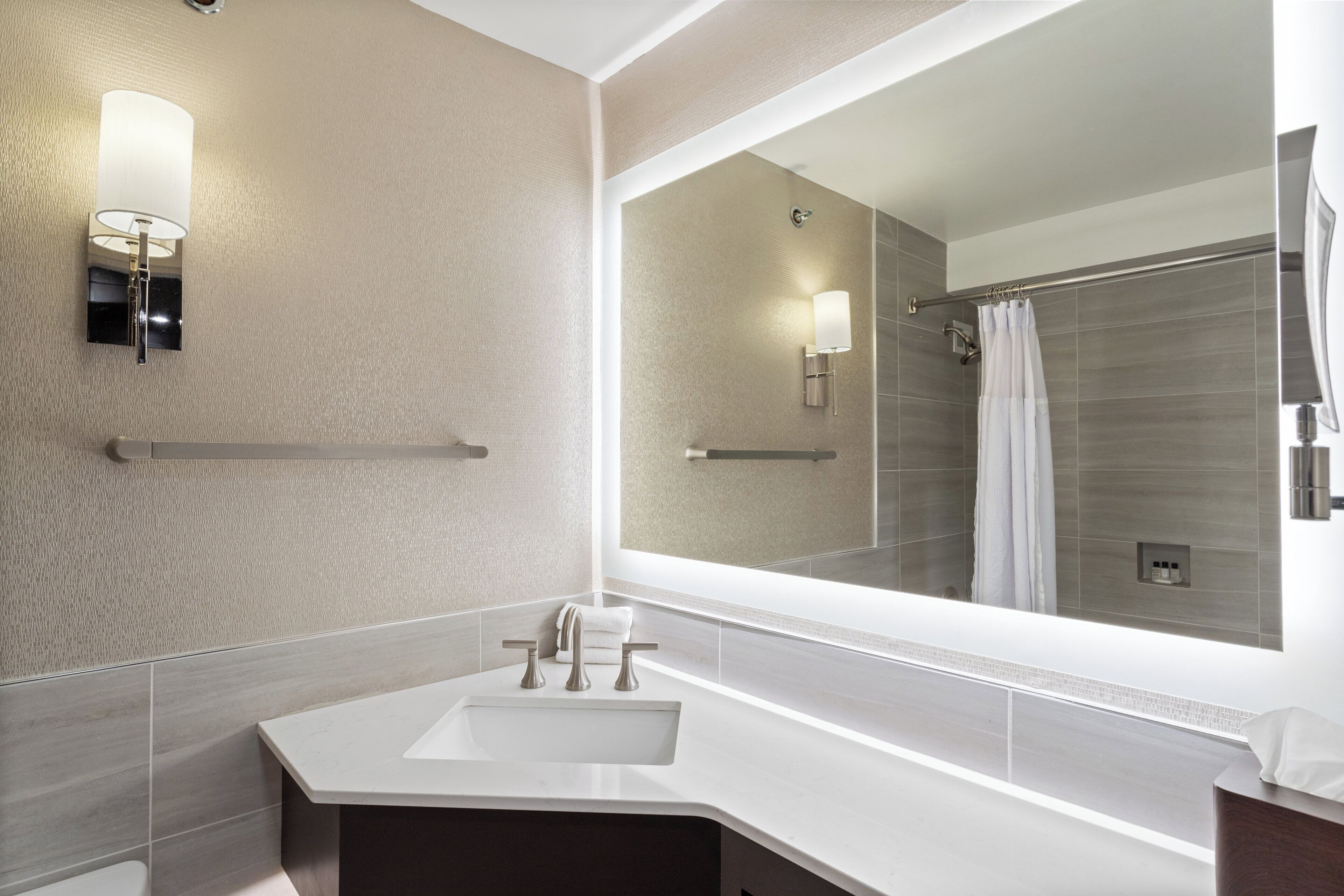 Premium bedding, desk, laptop workspace, soundproofing