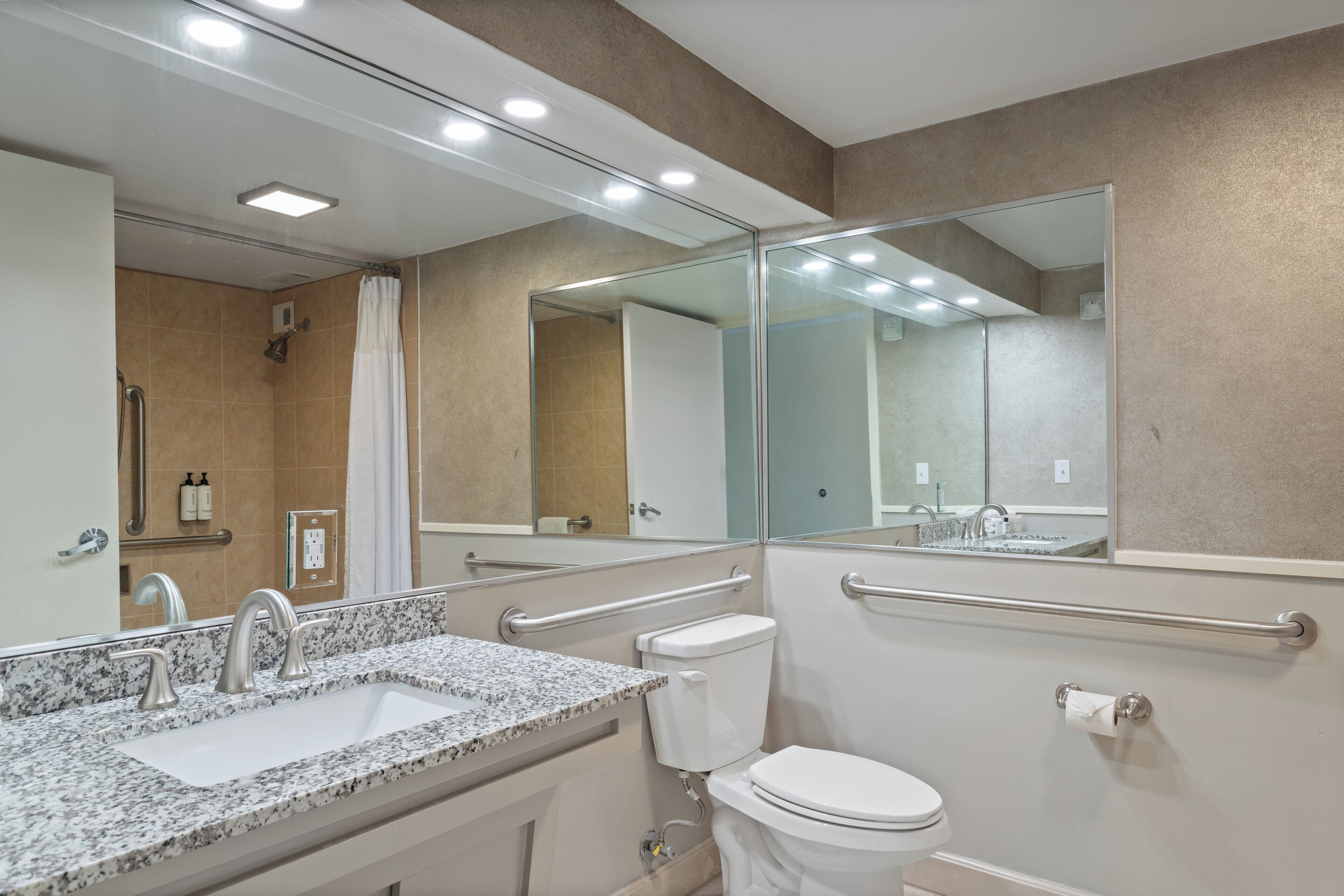 Premium bedding, desk, laptop workspace, soundproofing