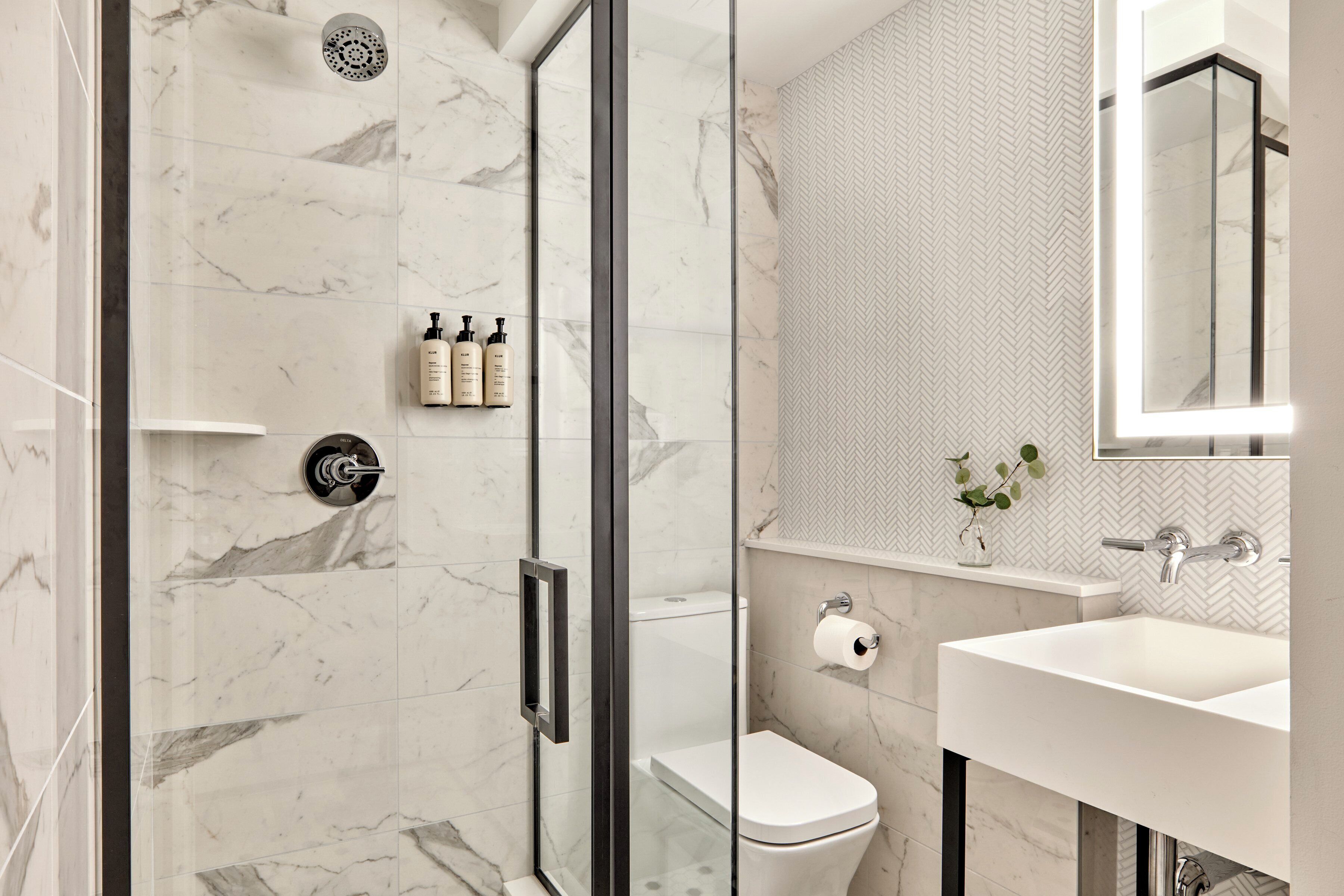 room, 1 single bed (petite room 1 twin) | bathroom | free toiletries, hair dryer, bathrobes, towels