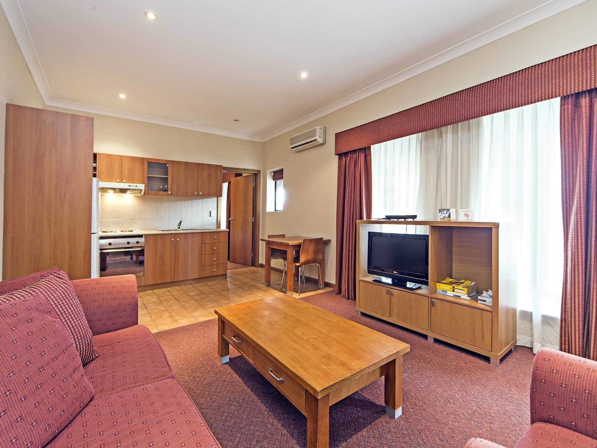 studio, 1 queen bed | living area | lcd tv