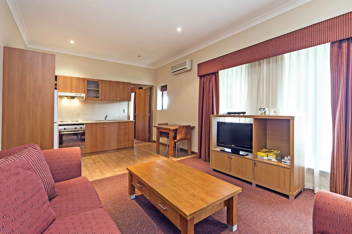 studio, 1 queen bed | living area | lcd tv