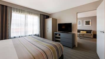 Premium bedding, down comforters, in-room safe, desk