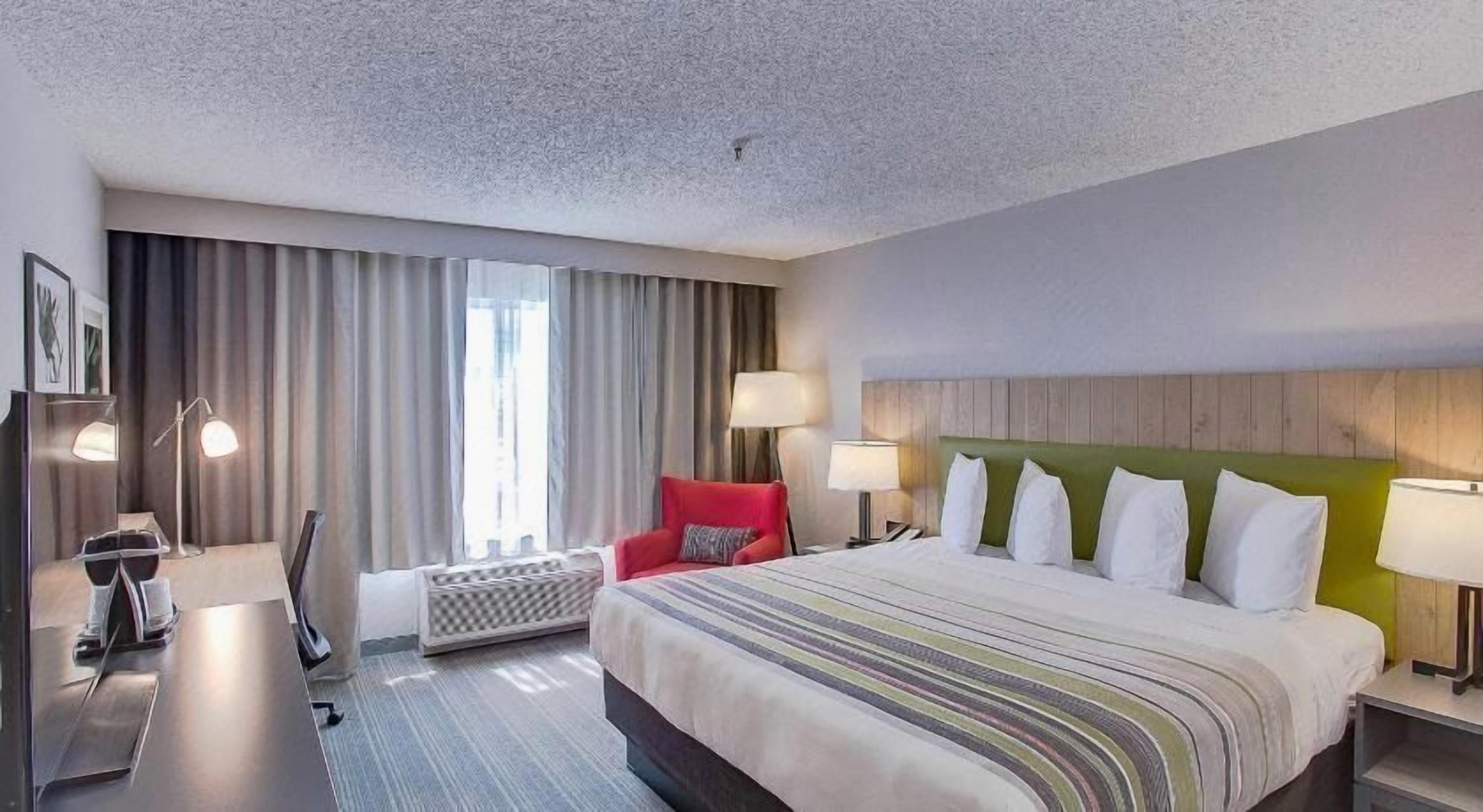 Premium bedding, down duvets, in-room safe, desk