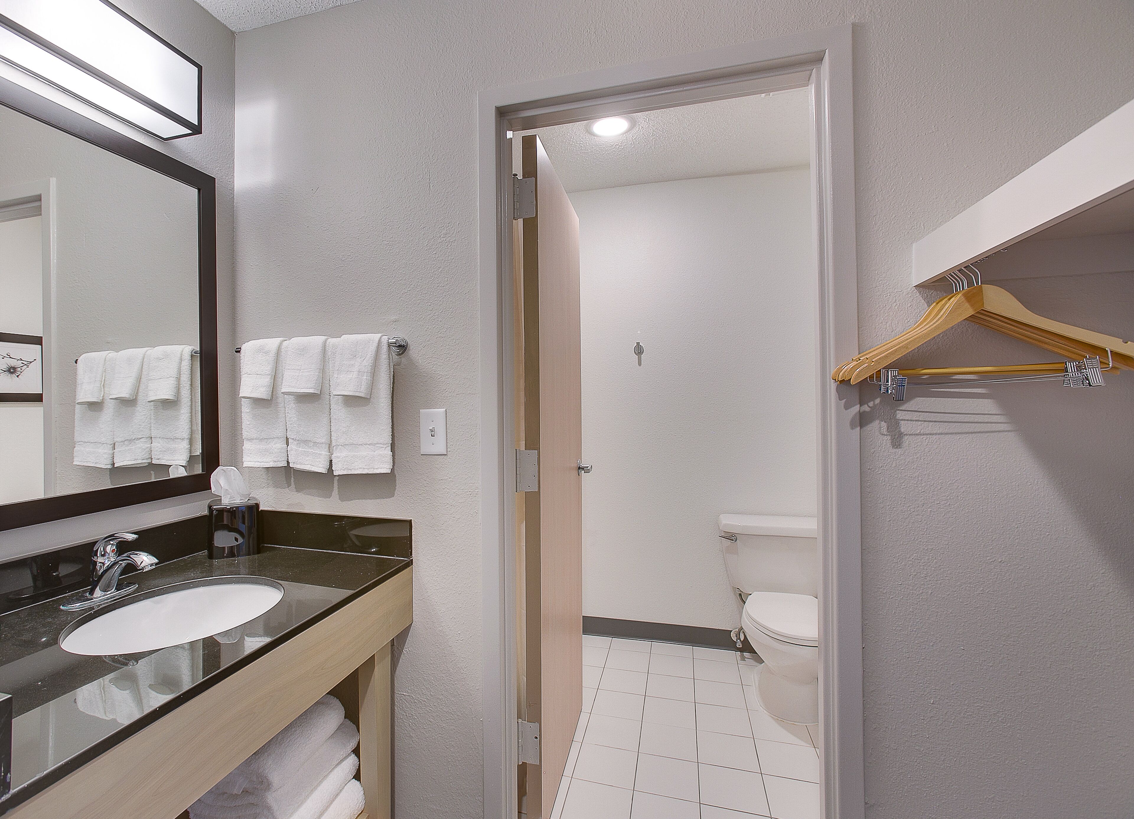 studio suite, 1 king bed, non smoking | bathroom | hair dryer, towels