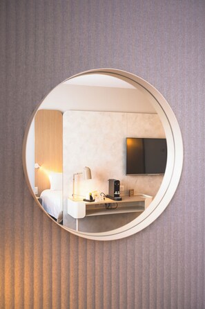 Premium bedding, memory-foam beds, in-room safe, desk
