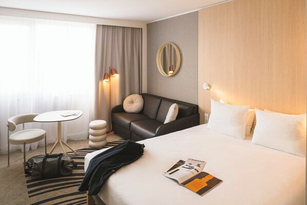 Premium bedding, memory-foam beds, in-room safe, desk