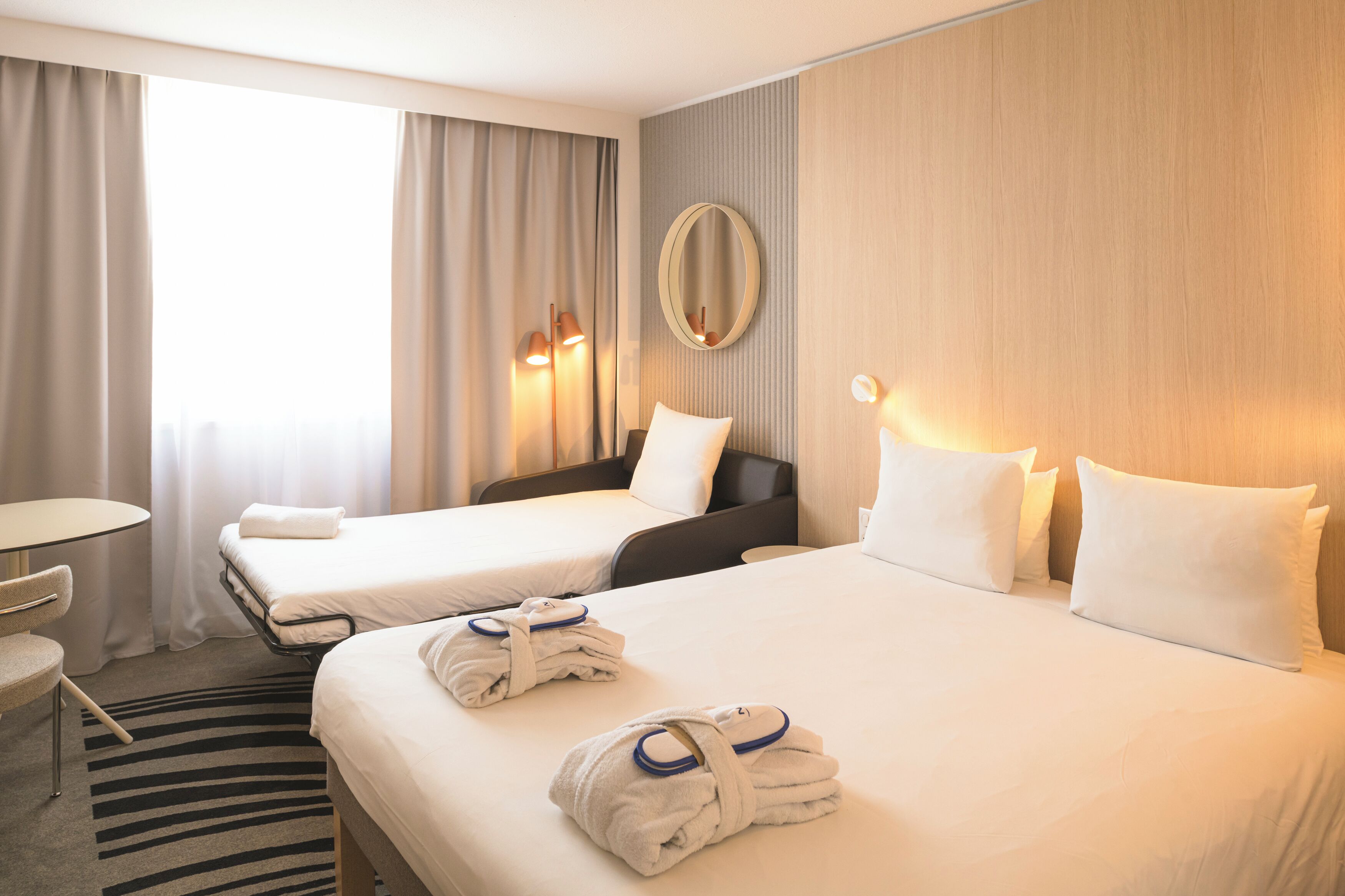 premium bedding, memory-foam beds, in-room safe, desk