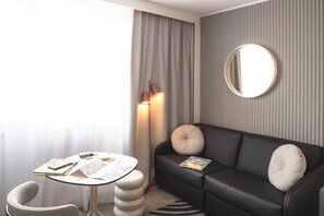 Premium bedding, memory-foam beds, in-room safe, desk