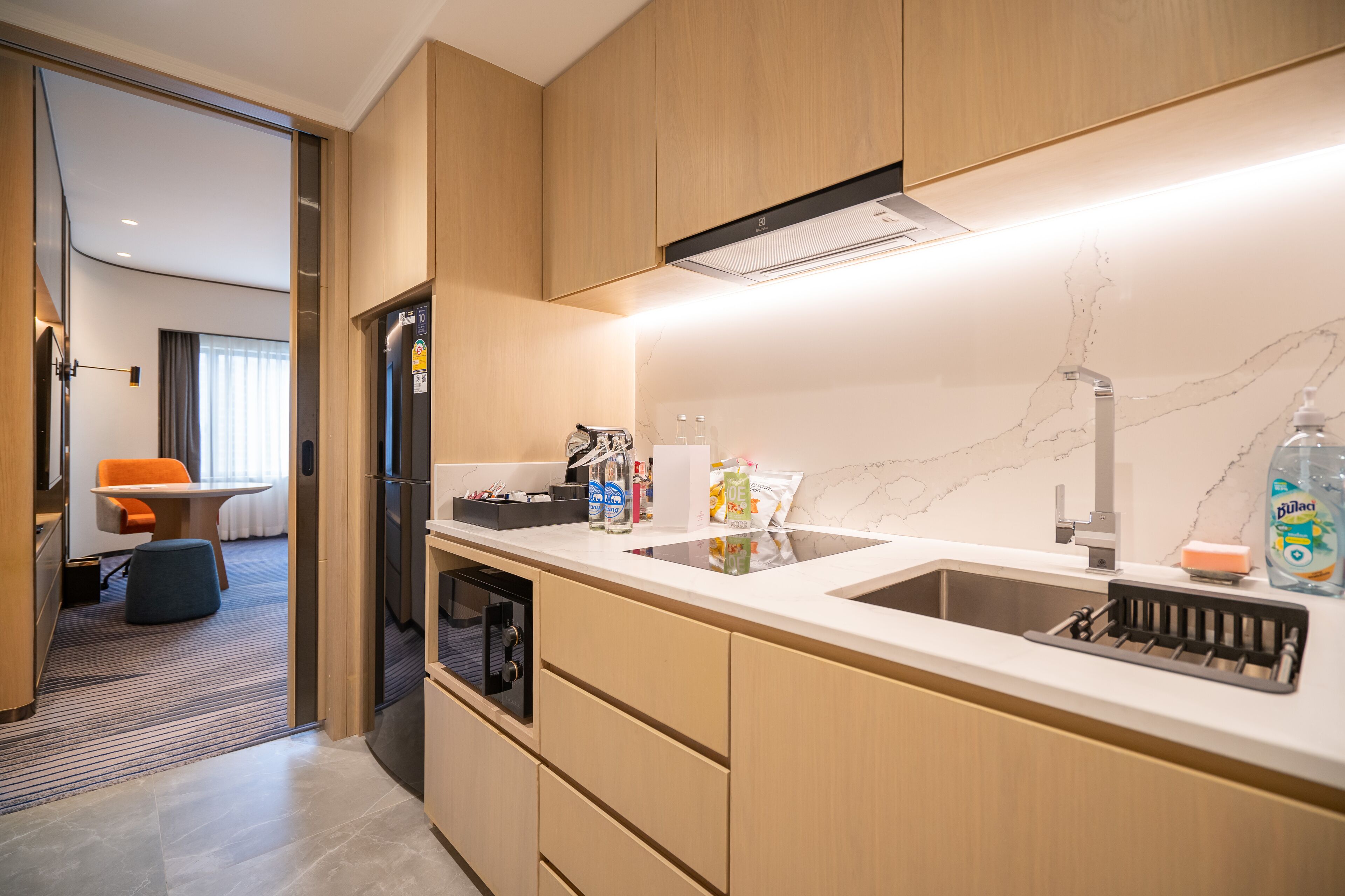 premium room, 1 king bed, kitchenette | private kitchen | fridge, coffee/tea maker