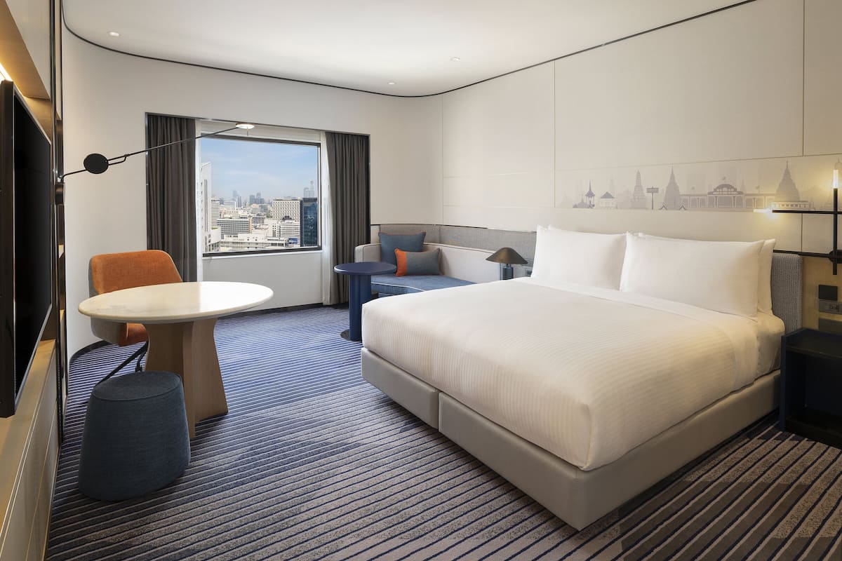 Premium Room, 1 King Bed, Kitchenette | Premium bedding, minibar, in-room safe, individually decorated