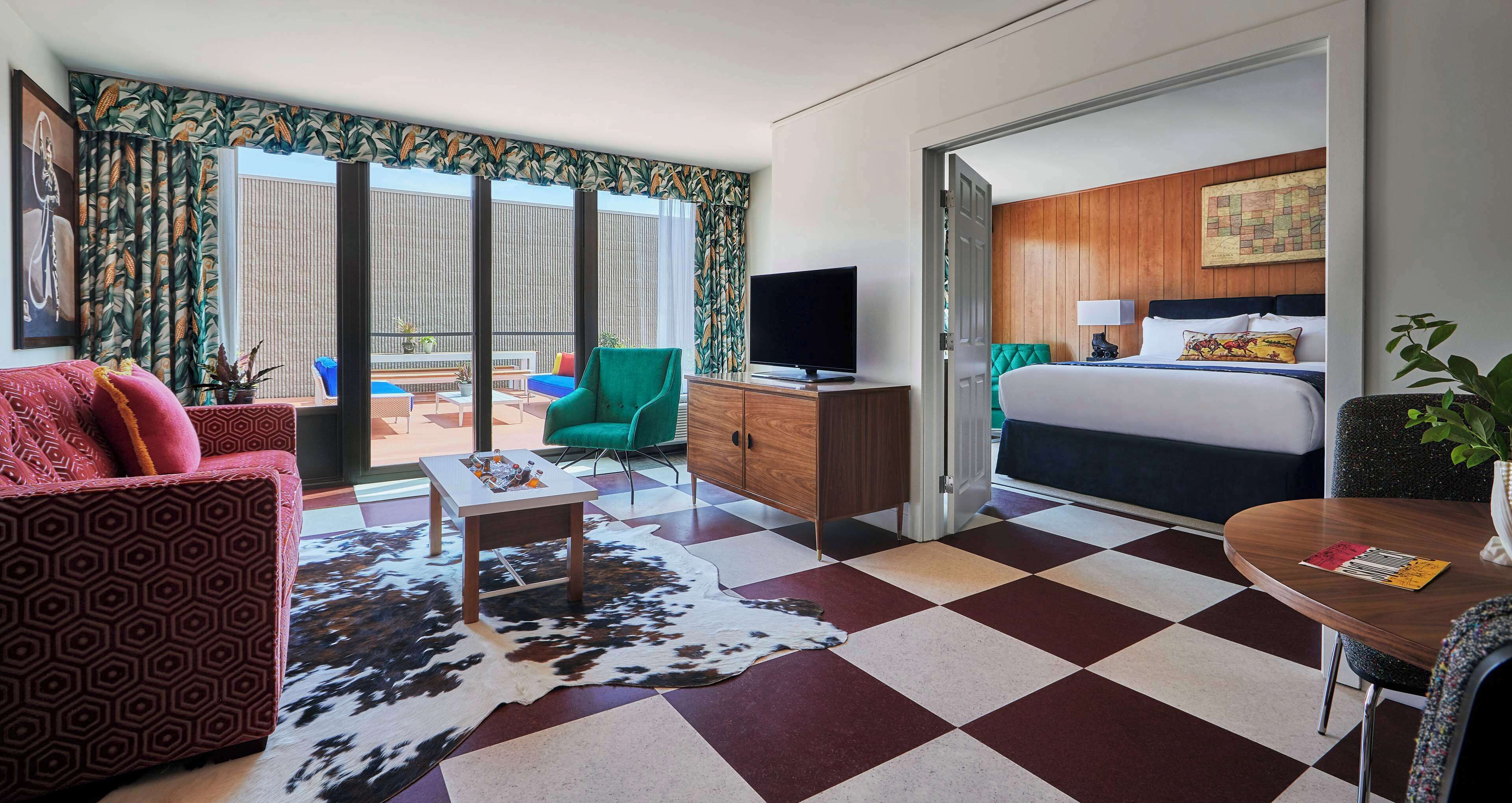 suite, 1 king bed, terrace | living area | flat-screen tv