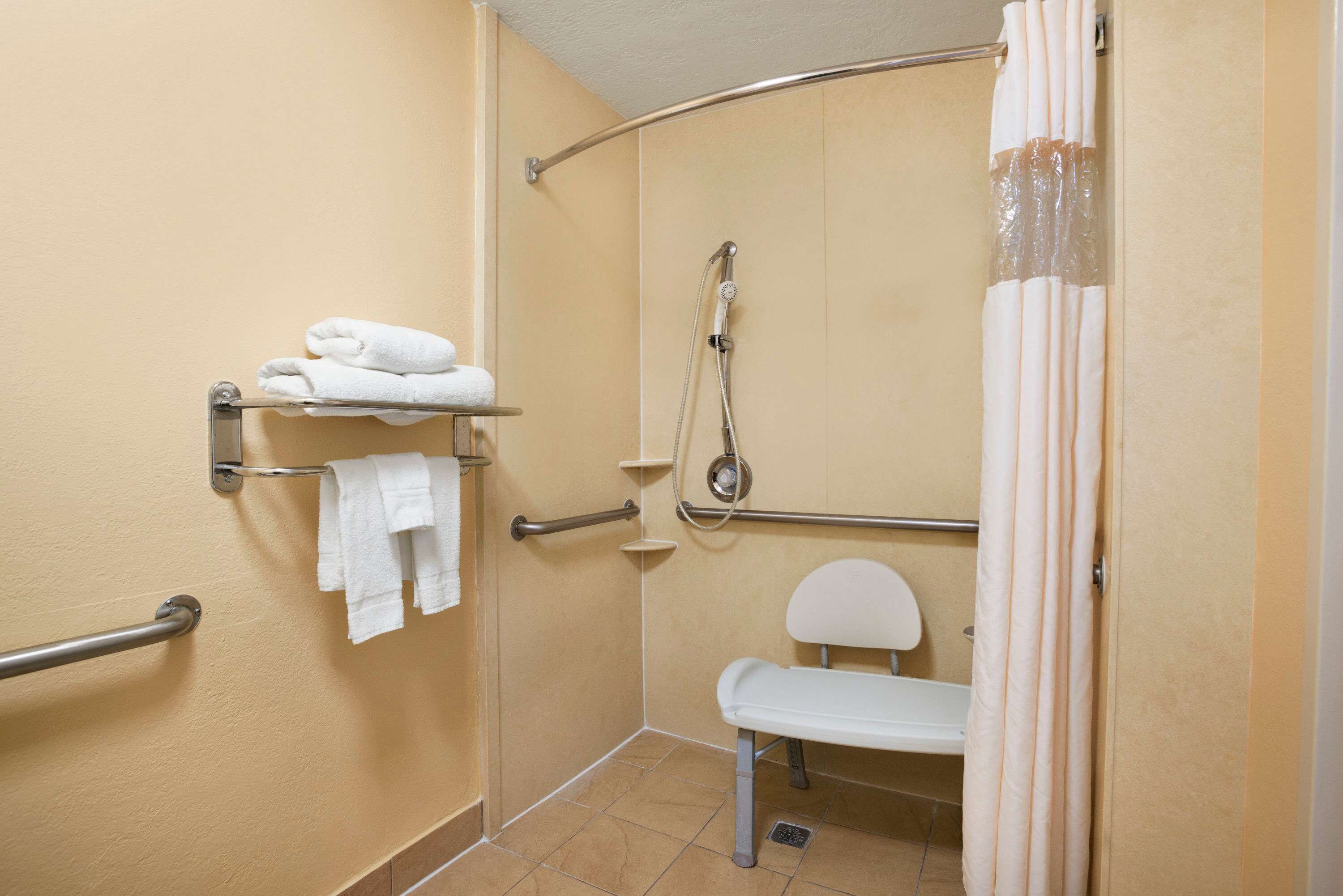 combined shower/bathtub, free toiletries, hair dryer, towels