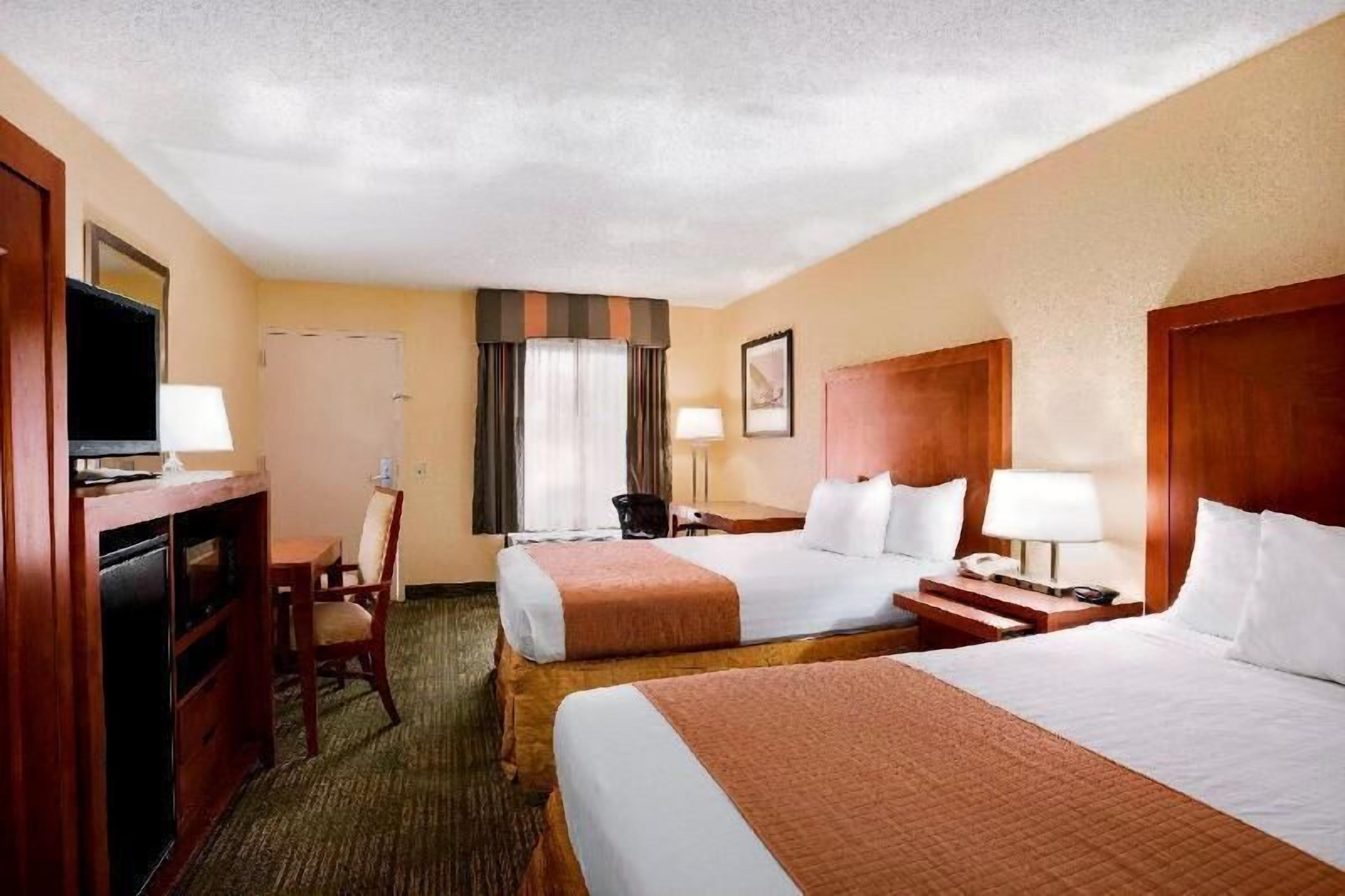 Premium bedding, desk, blackout curtains, soundproofing