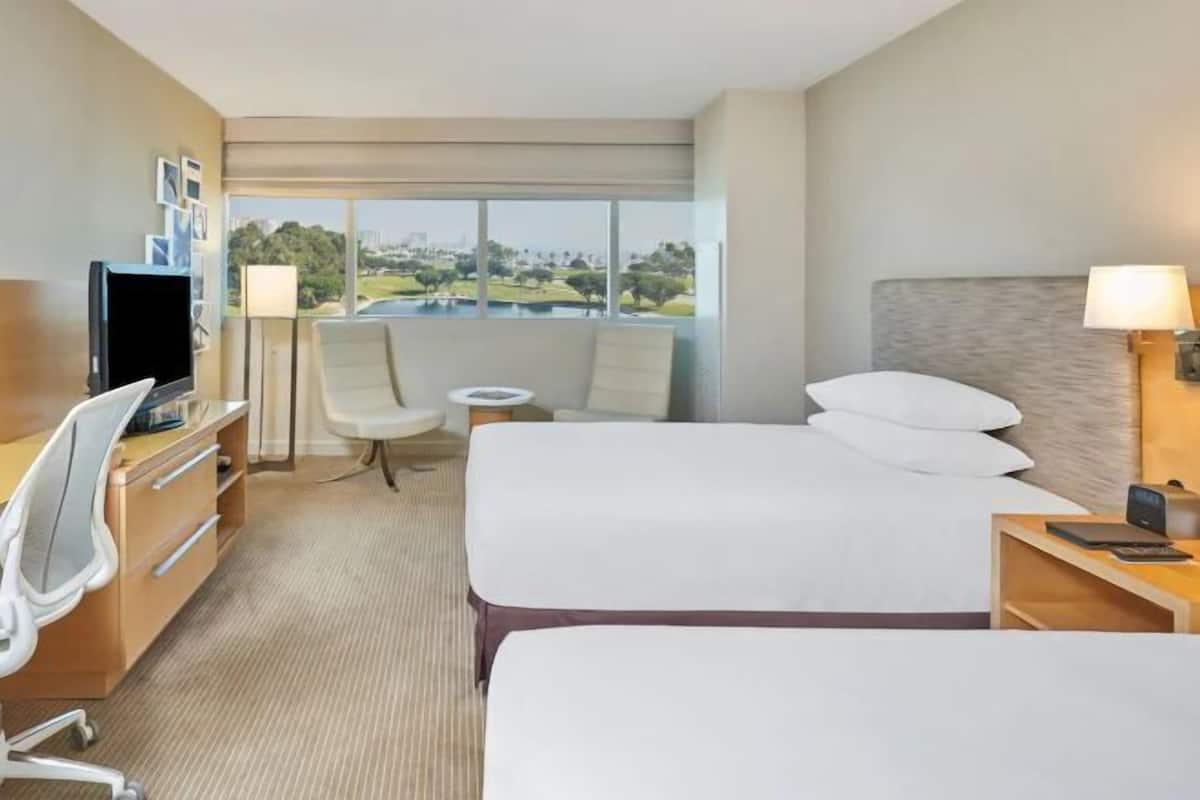 Premium bedding, down duvets, in-room safe, desk