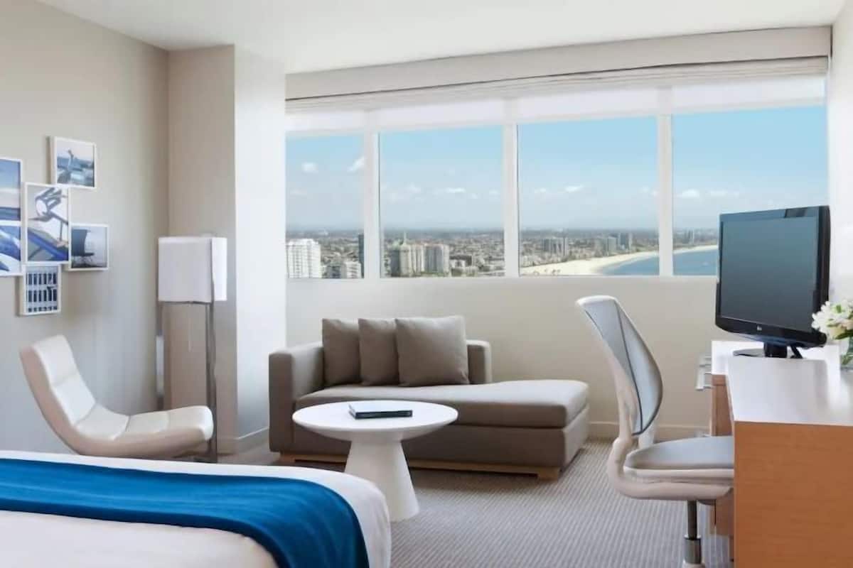 Premium bedding, down duvets, in-room safe, desk