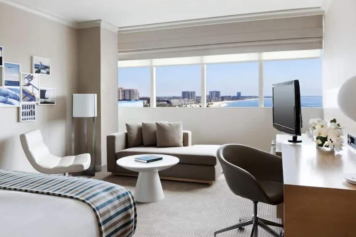 Premium bedding, down duvets, in-room safe, desk