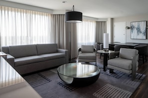 Club Suite, 1 Bedroom | Living area | Flat-screen TV, iPod dock