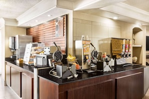 Enjoy a convenient breakfast at this well-equipped bar with a waffle maker, coffee machine, and fresh pastries.