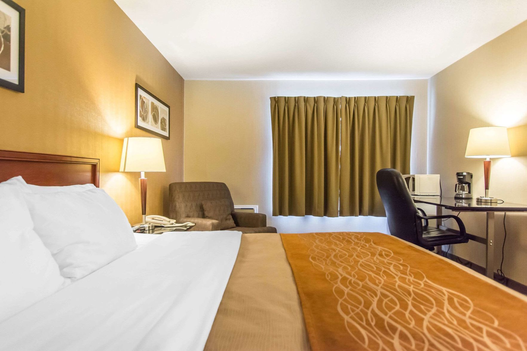 Premium bedding, desk, blackout curtains, iron/ironing board