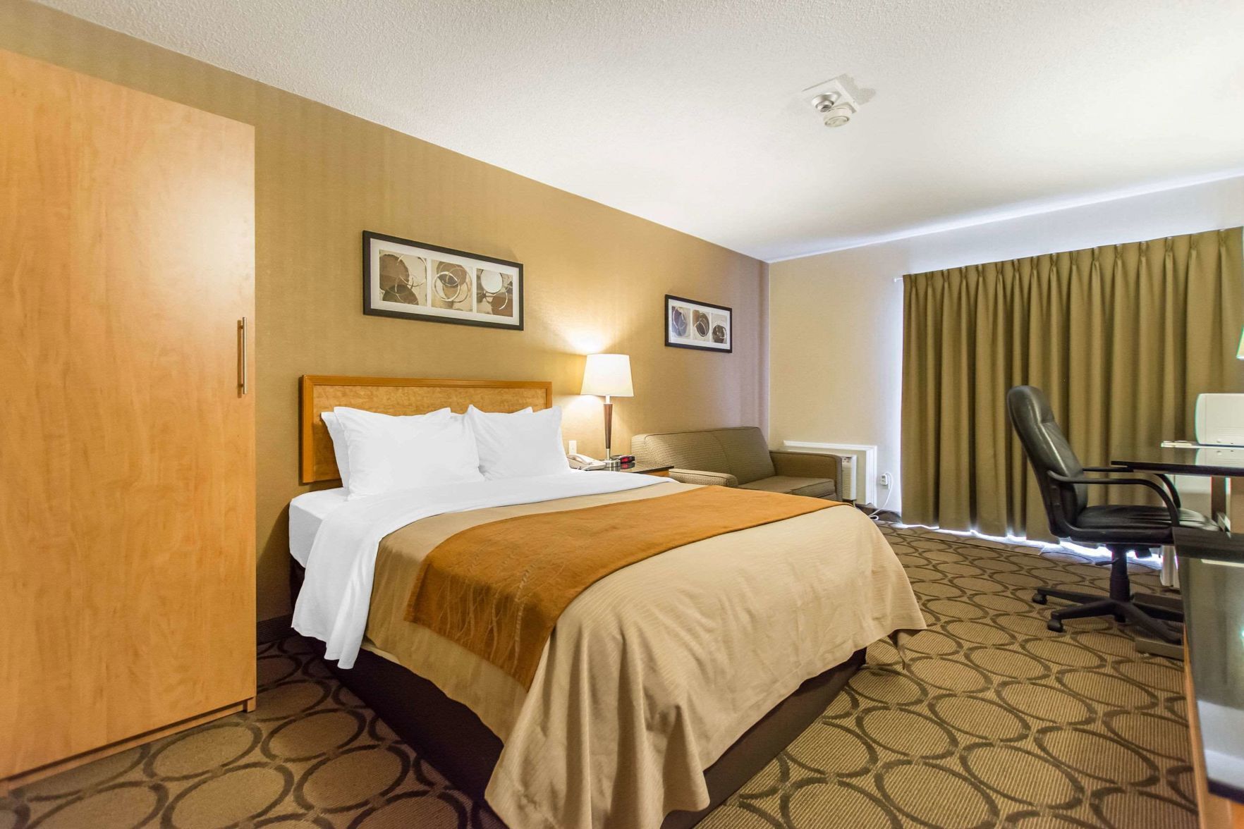 Premium bedding, desk, blackout curtains, iron/ironing board